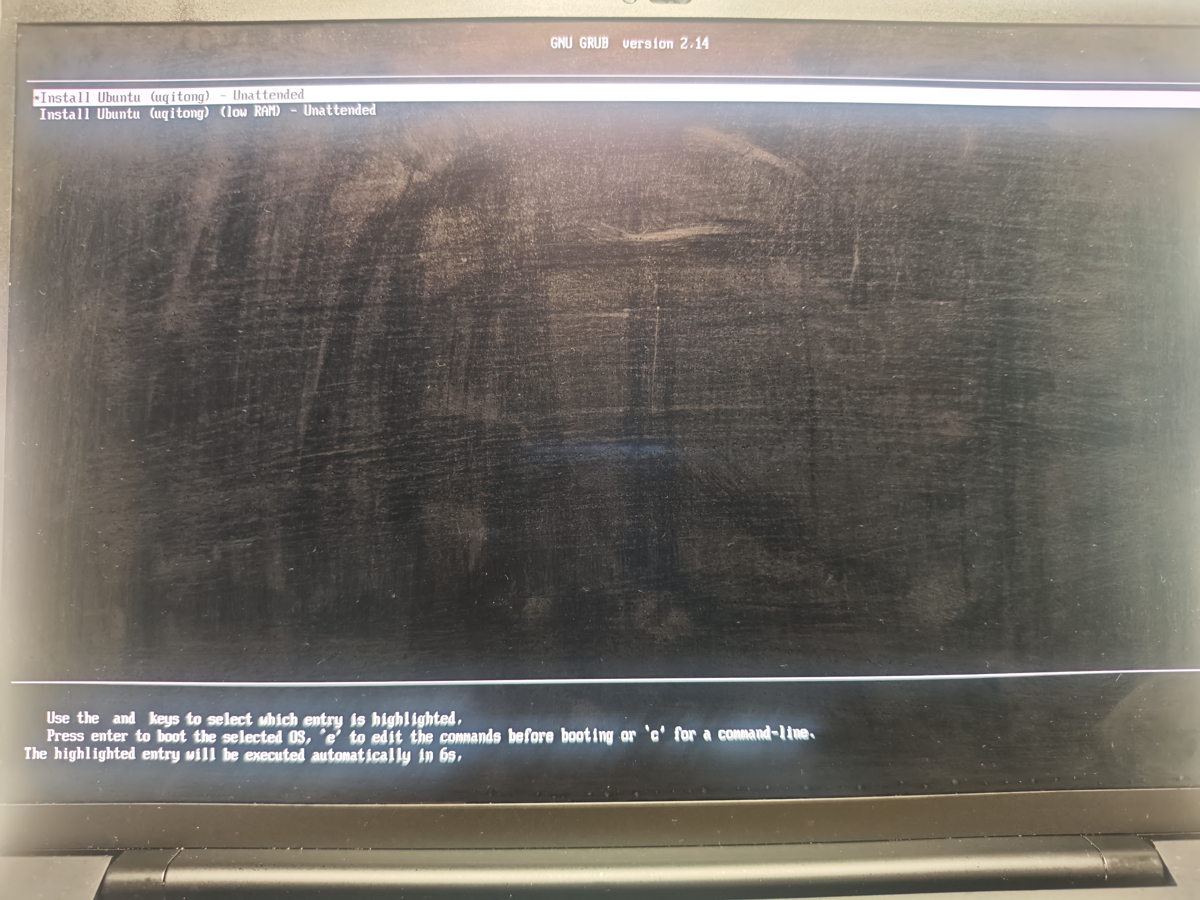 The temporary uqitong GRUB menu with Install Ubuntu Unattended selected